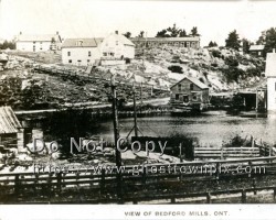 A view of the village showing both the mill and power plant on the right. ca. 1920s Townsite