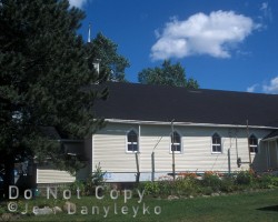 The former Roman Catholic Church (a later addition) is now a home. Building