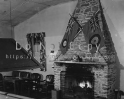 The Officers' Mess in 1961. The handsome fireplace, along with a "Ladies Room" that resembled an English pub, were constructed during the RAF occupancy from mess profits. Mess hall