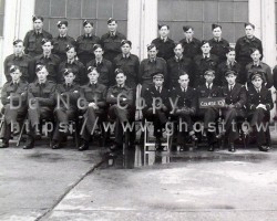 A group of British airmen. enrolled in No.107 Course, RAF Picton, pose for a group photo in March 1944. British airmen