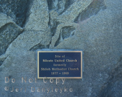 There's very little to indicate Silcote ever existed. Commemorative plaque on a stone at the former site of the United Church Photo of plaque