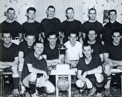 The championship Silcote Soccer Team post with the Carling Trophy in 1957 Group photo