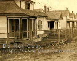 An early view of the townsite, ca. 1920 Photo of houses