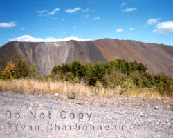 Waste rock and slag from the new operations in 2000 Photo of rock
