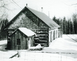 An earlier view of the schoolhouse along with an outbuilding Photo of schoolhouse